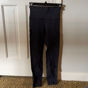 Lululemon leggings with mesh, size 4.